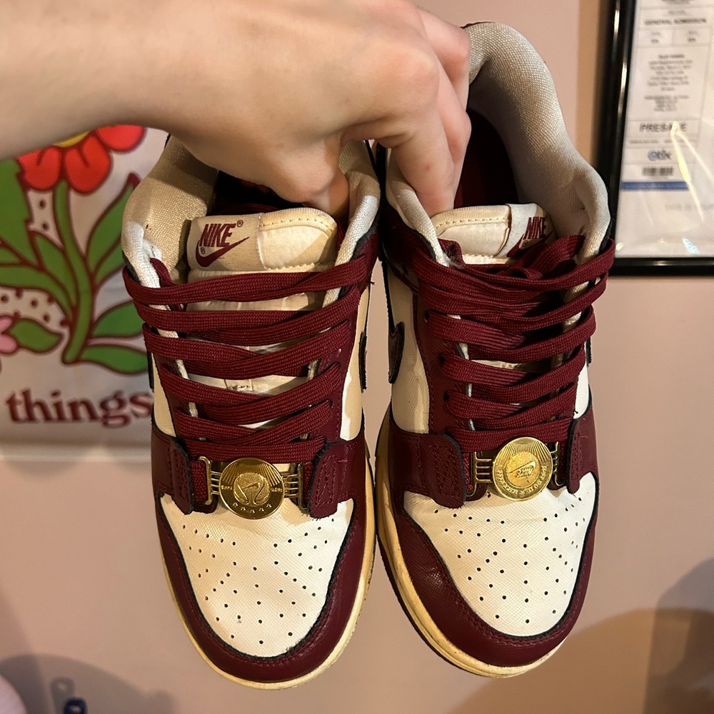 Woman’s Nike “sisterhood”  dunks